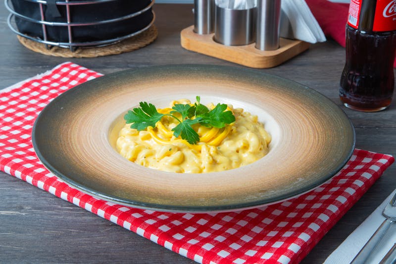 Creamy Mac and Cheese baked golden on top