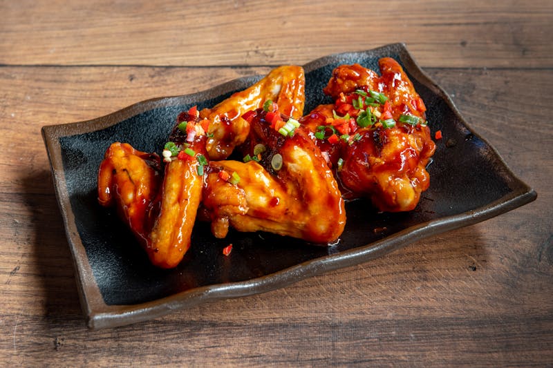 Honey Gold Wings glazed with sweet golden sauce
